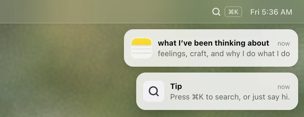 A Tip notification under the Notes notification: Press ⌘K to search, or just say hi.